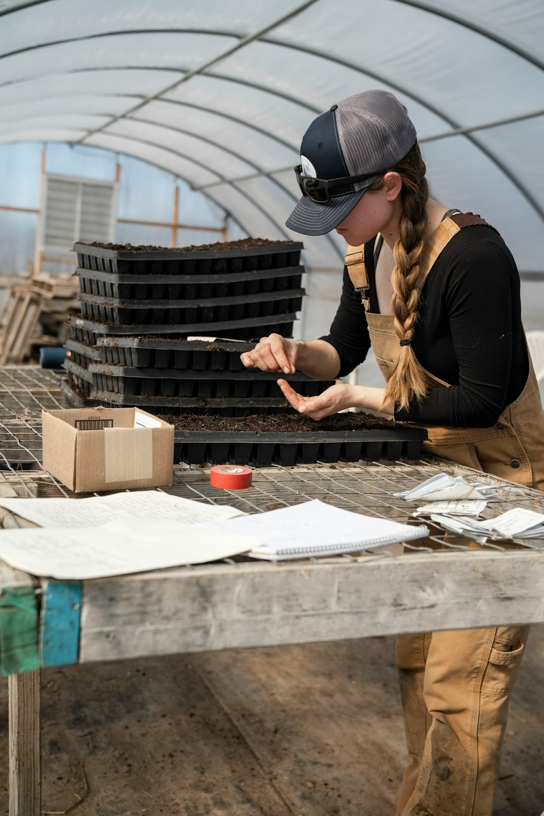 Photo of and by Zoe Schaeffer, instagram.com/dirtjoy, zoeschaeffer.com. Shot at Pasture Song Farm in Pennsylvania. Pictured: seeding flowers in spring